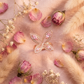 Bague papillon or rose zircon rose flat lay cocooning